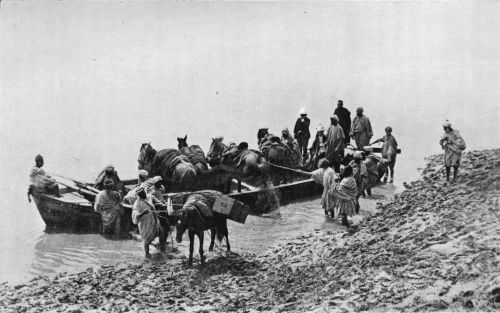 CROSSING A MOROCCO RIVER.